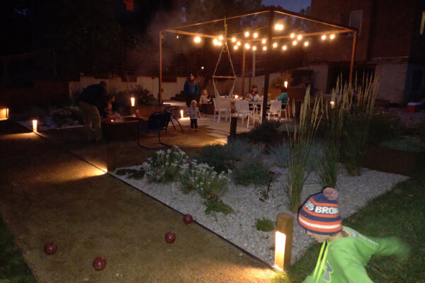 Bozeman Outdoor Living with landscape lighting and fire pit and bocce court