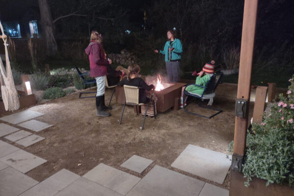 Bozeman Patio and custom steel fire pit gathering space and custom landscape lighting