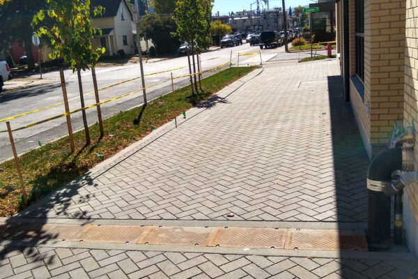 Commercial Landscaping with Permeable Pavers Sidewalks