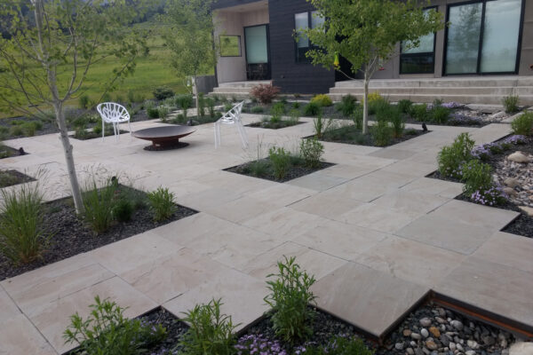 Modern Bozeman Patio with Sculptural Fire Pit and amazing mountain viesw