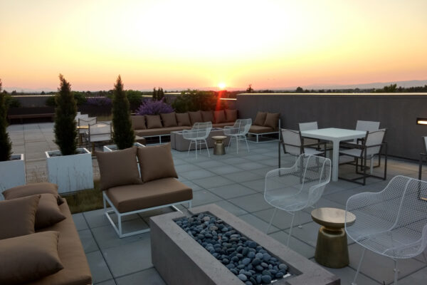 Modern Rooftop Landscaping with Gas Fire Pit and Concrete Paver Patio on roortop in Bozeman Montana