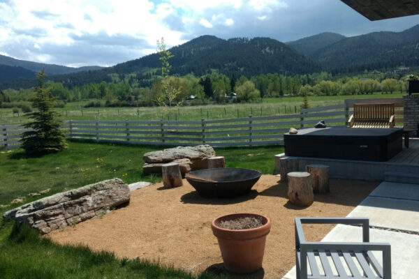 South Bozeman Farmhouse Fire pit Patio and Hot Tub Outdoor Living Space