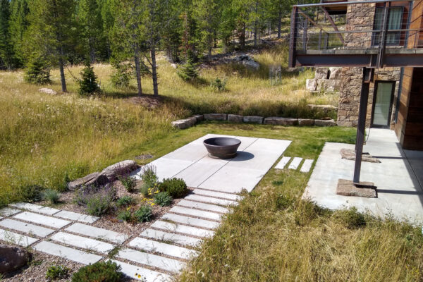 Yellowstone Club Patio with fire pit and native landscaping
