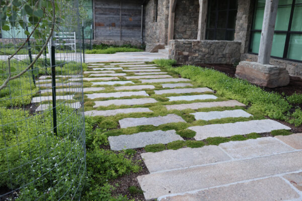 Boulders and Flagstone Patios in Big Sky Montana Landscaping Project